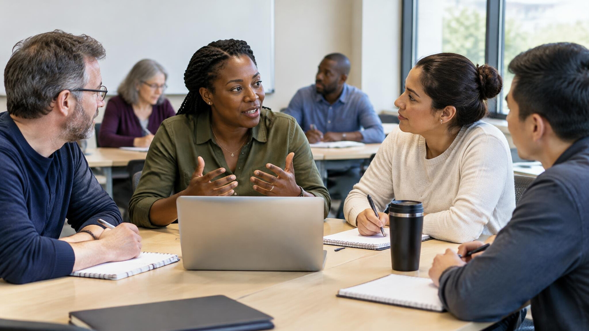adult students discussing in classroom
